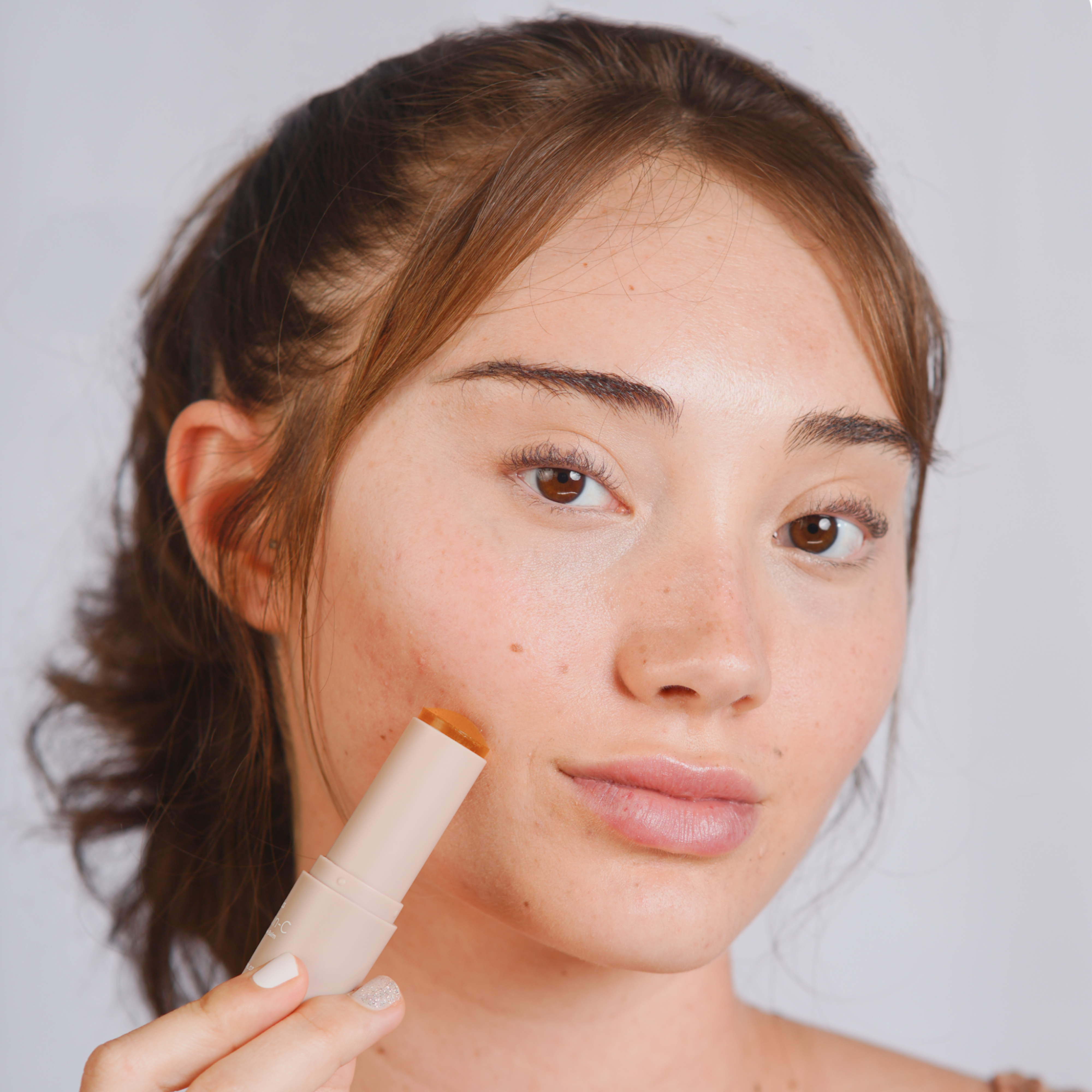 A single green leaf against a white background.